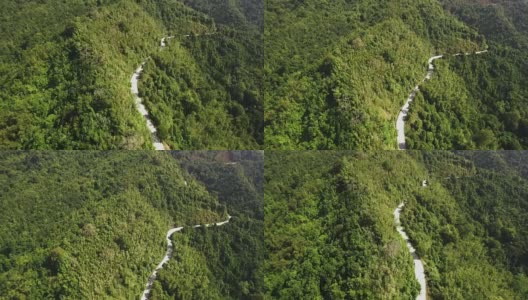 一对夫妇骑着摩托车在山路上航拍高清在线视频素材下载