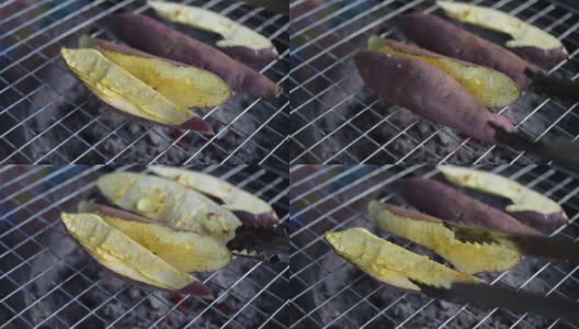 手烤红薯炉烤，泰国街头小吃高清在线视频素材下载