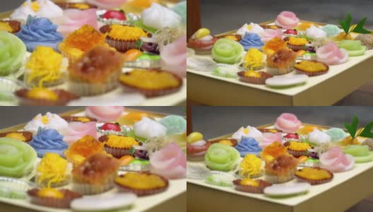 极致特写俯视图美丽的泰国甜点在一口大小的块。高清在线视频素材下载