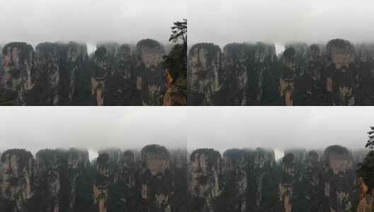 美丽的鸟瞰图飞行无人机十英里自然画廊在一个雨天在张家界武陵源国家森林公园中国湖南高清在线视频素材下载