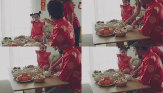 一家人在中国新年那天吃饭。高清在线视频素材下载