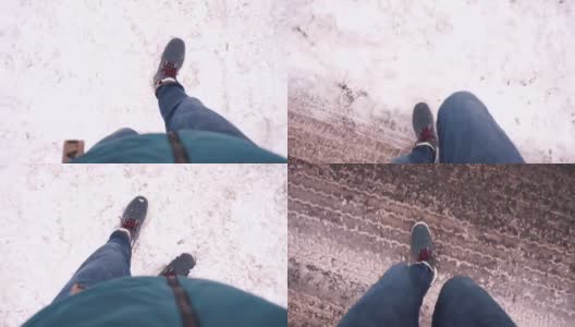 行人在雪地上走路时会打掉鞋上的雪高清在线视频素材下载