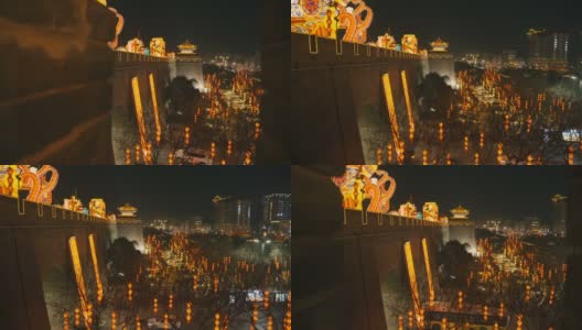中国陕西西安，古代城墙上的灯笼庆祝中国春节高清在线视频素材下载