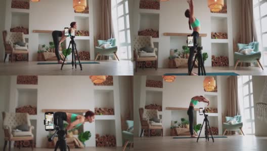 女运动员正在拍摄她的健身视频博客。在线学习直播高清在线视频素材下载