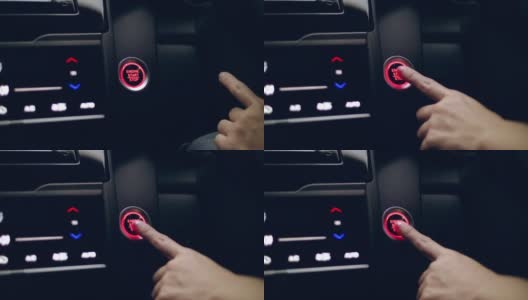 特写的女性手指推动汽车启动-停止灯按钮上的一辆汽车的仪表盘高清在线视频素材下载