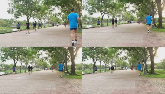一群人在公园里跑步高清在线视频素材下载