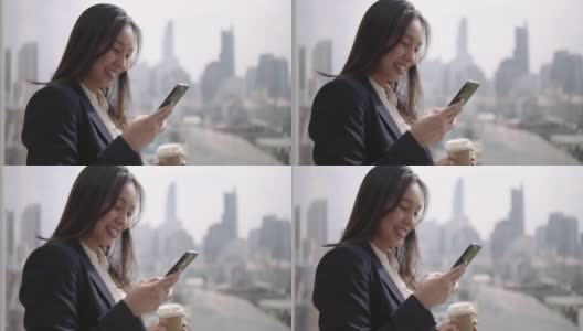 亚洲女商人使用智能手机高清在线视频素材下载