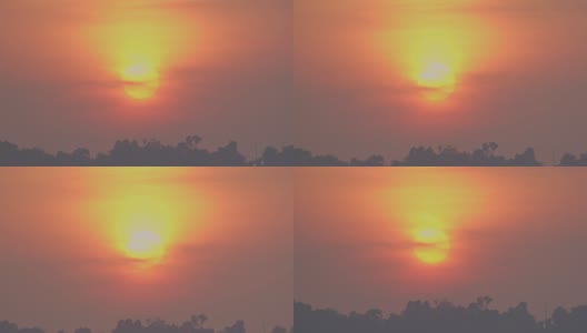 黄色的太阳照耀着山顶上红色的天空。高清在线视频素材下载