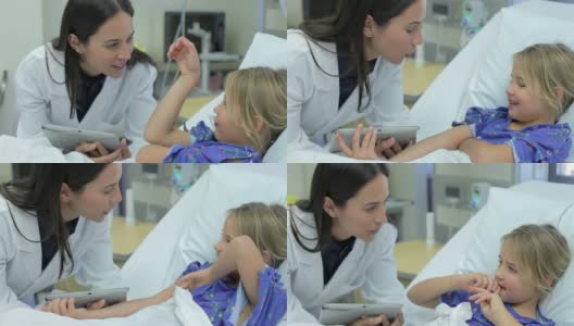 加护病房里的小女孩和女医生交谈高清在线视频素材下载