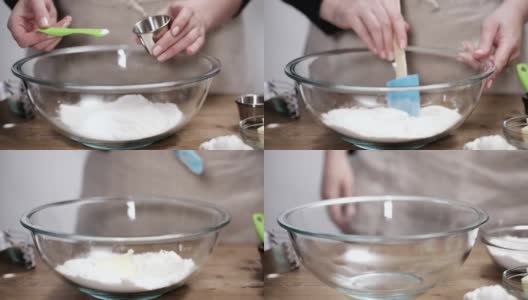 将饼皮配料混合在一起烘焙南瓜派。高清在线视频素材下载