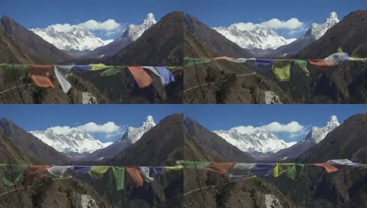 在尼泊尔喜马拉雅山脉的珠穆朗玛峰地区，西藏的经幡在白雪皑皑的山顶上飘扬高清在线视频素材下载