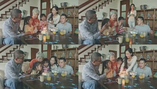 多代同堂的中国家庭在家里庆祝女儿的生日高清在线视频素材下载
