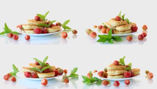 用熟草莓煎的甜煎饼放在盘子里高清在线视频素材下载