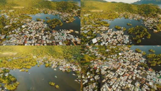 鸟瞰科伦市与贫民窟和贫困地区。巴拉望省。Busuanga岛。傍晚时间和日落高清在线视频素材下载