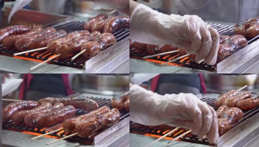 烤香肠在台湾台北，台湾著名的街头烧烤美食，实时，特写。高清在线视频素材下载