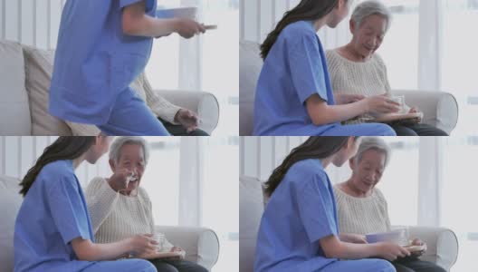亚洲年轻女性护理护士给82岁高龄的亚洲老奶奶送早餐。在家里照顾者高清在线视频素材下载