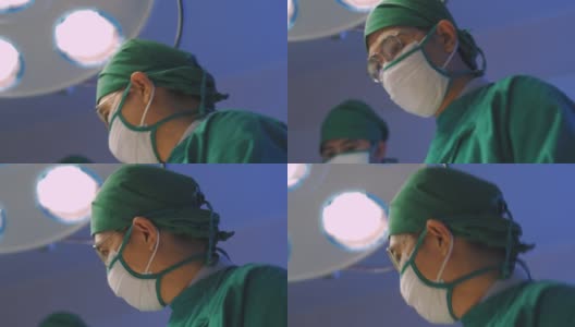 男外科医生进行外科手术的肖像。高清在线视频素材下载