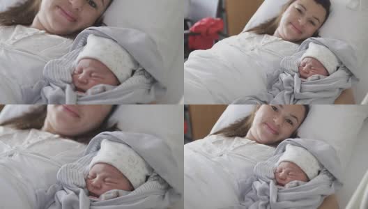 新出生的婴儿和他的母亲高清在线视频素材下载