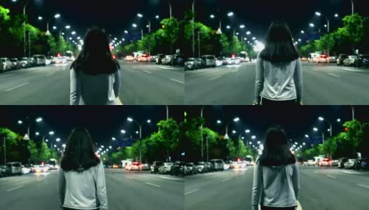 一个年轻女子晚上独自走在街上高清在线视频素材下载