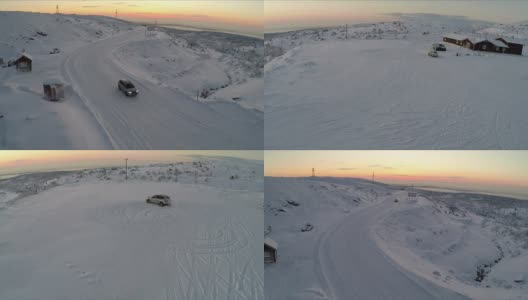 鸟瞰图的汽车驾驶积雪的道路和漂移高清在线视频素材下载