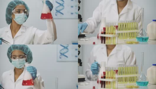 医学科学家进行生化研究，在烧瓶中进行化学反应高清在线视频素材下载
