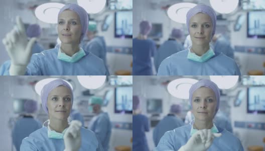 护士在手术室使用假想未来分析界面高清在线视频素材下载