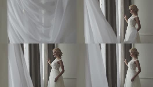 穿着婚纱摆姿势的美丽新娘高清在线视频素材下载