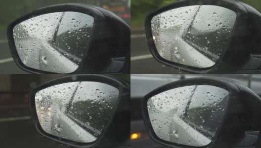 雨中行驶在高速公路上的汽车后视镜反射高清在线视频素材下载