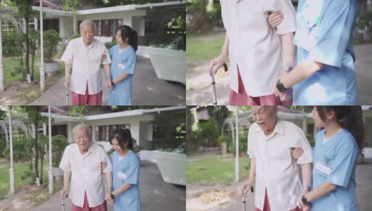护士协助老年病人在前院散步高清在线视频素材下载