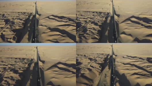 汽车在戈壁沙漠上行驶的实时/鸟瞰图高清在线视频素材下载