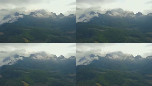 鸟瞰图。飞越高山森林与美丽的云雾，在Doi luang Chiang dao，泰国清迈。高清在线视频素材下载