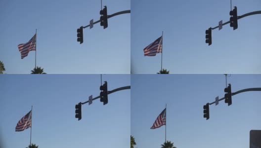 美国国旗在旗杆上飘扬的汽车pov, 180帧/秒高清在线视频素材下载