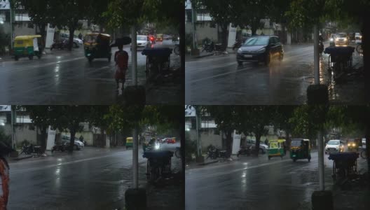 雨天的场景在一个城市，在雨中移动的交通高清在线视频素材下载