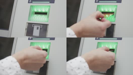 Inserting credit card into ATM, handheld shot高清在线视频素材下载