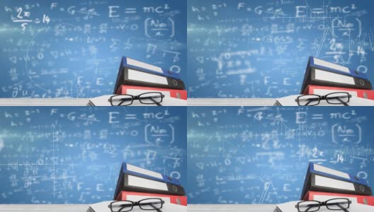 数字合成眼镜和多个文件对数学方程在蓝色背景高清在线视频素材下载