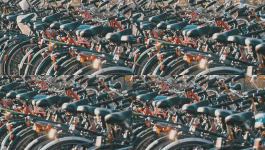 荷兰阿姆斯特丹- 2019年4月21日:自行车停车场。许多不同的自行车停放在街道的特殊停车场。农村的自行车超载问题高清在线视频素材下载