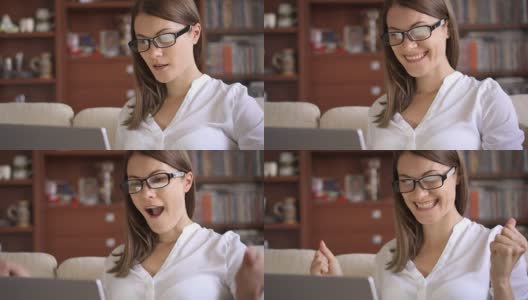女商人在家用笔记本电脑，女职业人士收到好消息兴奋开朗的微笑高清在线视频素材下载