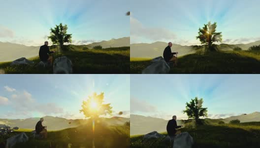爷爷在绿色的草地上欣赏日出，用摇盘高清在线视频素材下载
