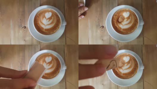 在卡布奇诺咖啡上撒糖高清在线视频素材下载