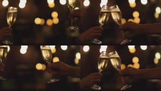 两只手握着酒杯，晚上干杯高清在线视频素材下载