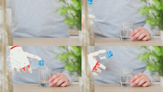 厨房里，一个手持机器人假肢的人正在把瓶子里的水倒进玻璃杯里高清在线视频素材下载