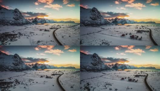在挪威罗浮敦群岛忧郁的日落天空下，飞越北欧冬季景观高清在线视频素材下载