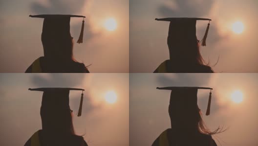 近景大学毕业生的背影在剪影日落高清在线视频素材下载
