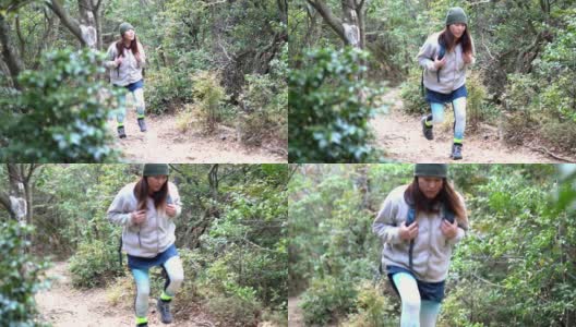 独自在山林中徒步旅行的女人高清在线视频素材下载