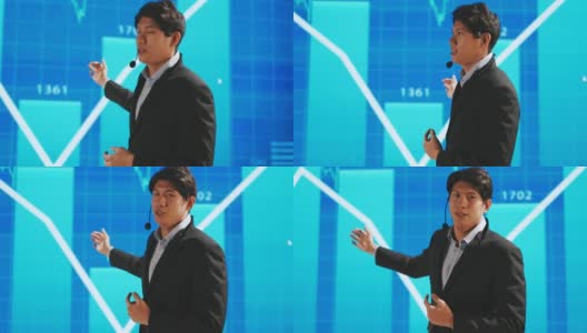 亚洲男性演讲者站在舞台上做商业演讲高清在线视频素材下载
