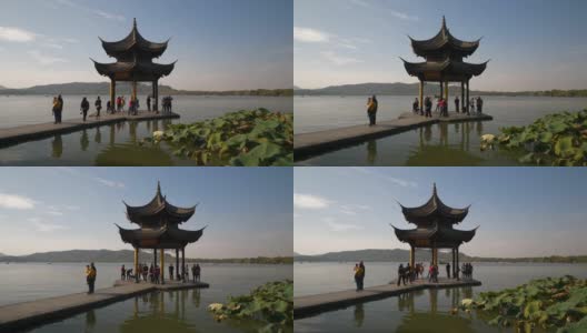 晴朗的一天时间杭州城著名的西湖码头宝塔慢镜头全景4k中国高清在线视频素材下载