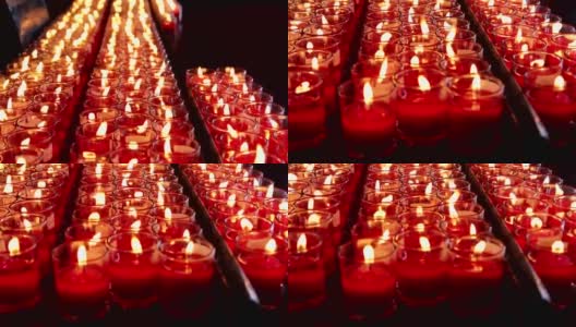 中国寺庙里成排燃烧的蜡烛高清在线视频素材下载