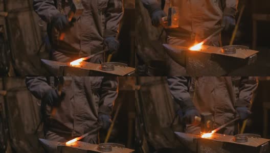 铁匠锻造熔化的金属高清在线视频素材下载