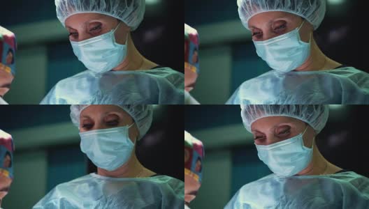 一个女外科医生的眼睛的特写。外科医生在手术中的肖像。高清在线视频素材下载