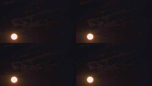 满月在乌云密布的夜空中升起。时间流逝高清在线视频素材下载
